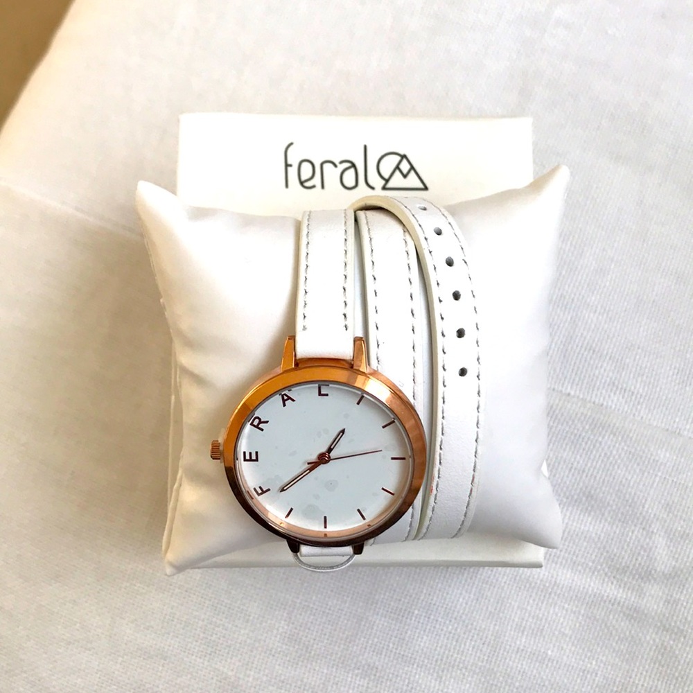 White feral rose gold watch